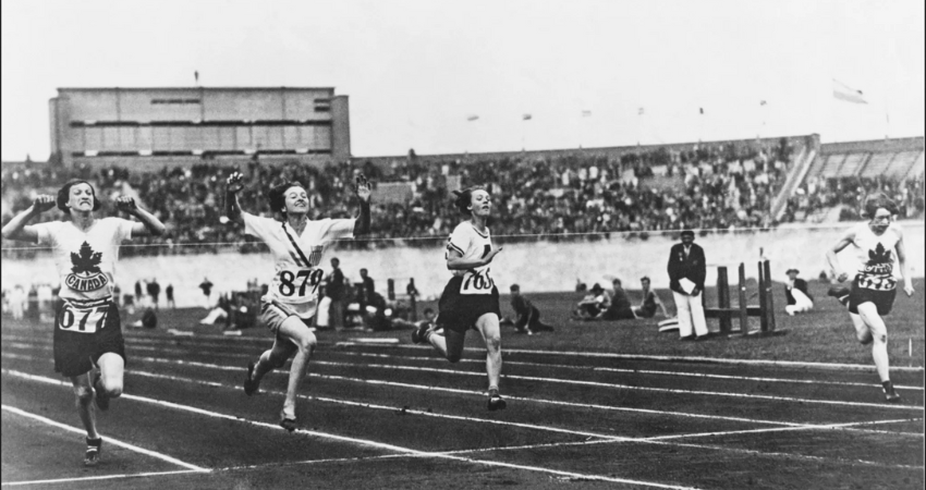 Betty Robinson crosses the finish line to win the first Olympic gold in the women’s 100m final in 1928.